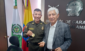 visita y entrega de la moneda GOCAR